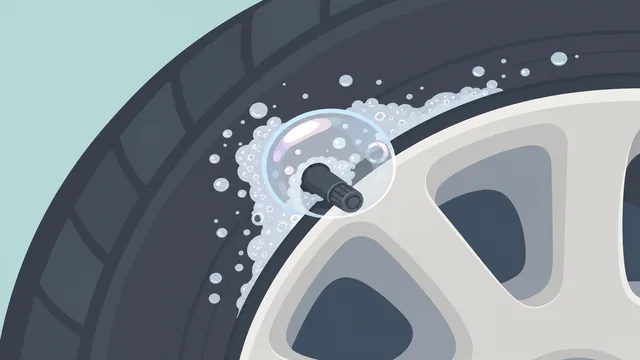 Soapy water sprayed on a tire valve and tread to find leak bubbles